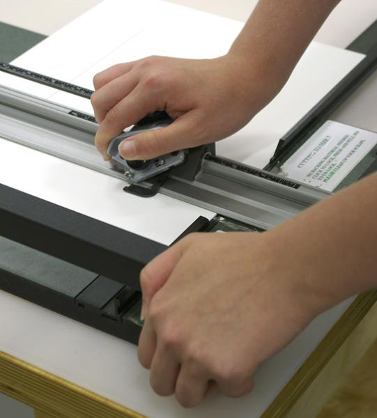 Using a handheld mat cutter - Matting, Framing, and Hanging Your  Photographs Video Tutorial